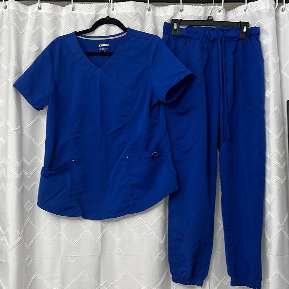 Blue medium scrub top and pants.